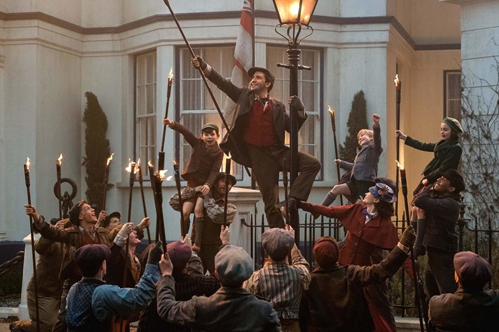 Lin-Manuel Miranda's Jack leads the lamplighters and the Banks children in "Trip a Little Light Fantastic" in MARY POPPINS RETURNS (2018)